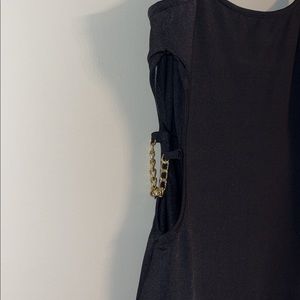 Mini going out dress from Pitaya. Gold chains cutouts and straps.